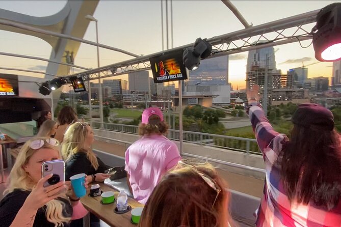 Open Air Party Bus with DJ & Bartender 21+ - DJ, bartender, and screens keep the party moving
