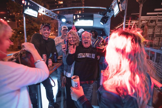 Private Open Air Party Bus with DJ & Bartender 21+ - Nissan Stadium brings a useful photo stop